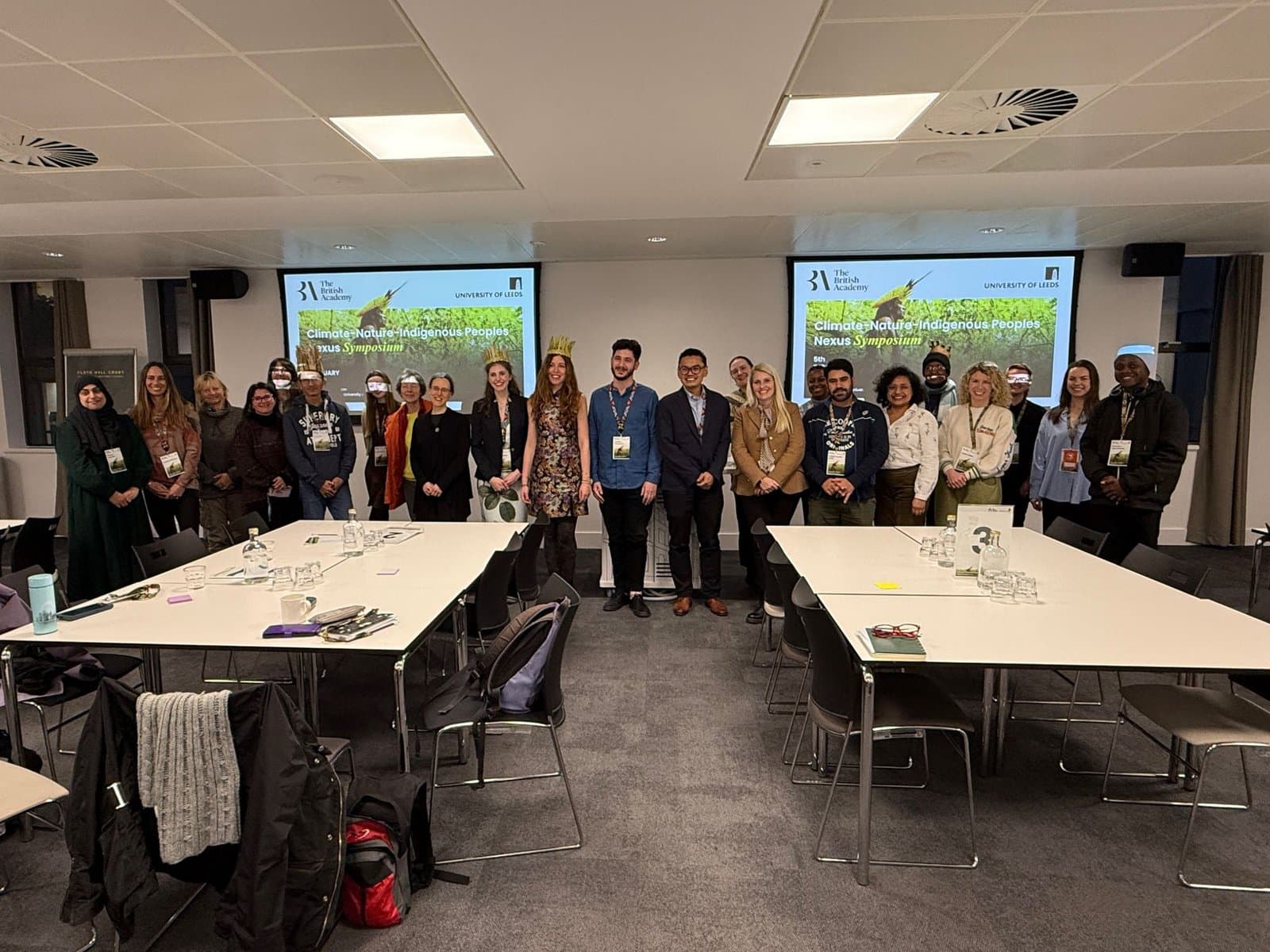 Symposium participants in the conference room